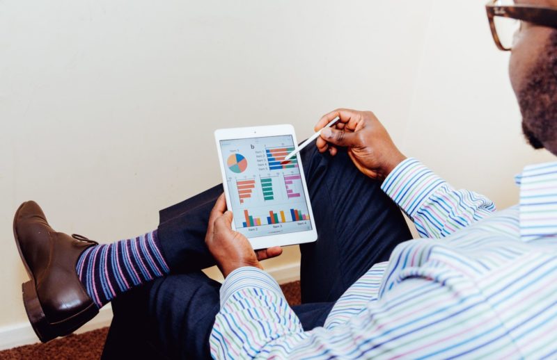 Man holding tablet doing business Man holding tablet doing business